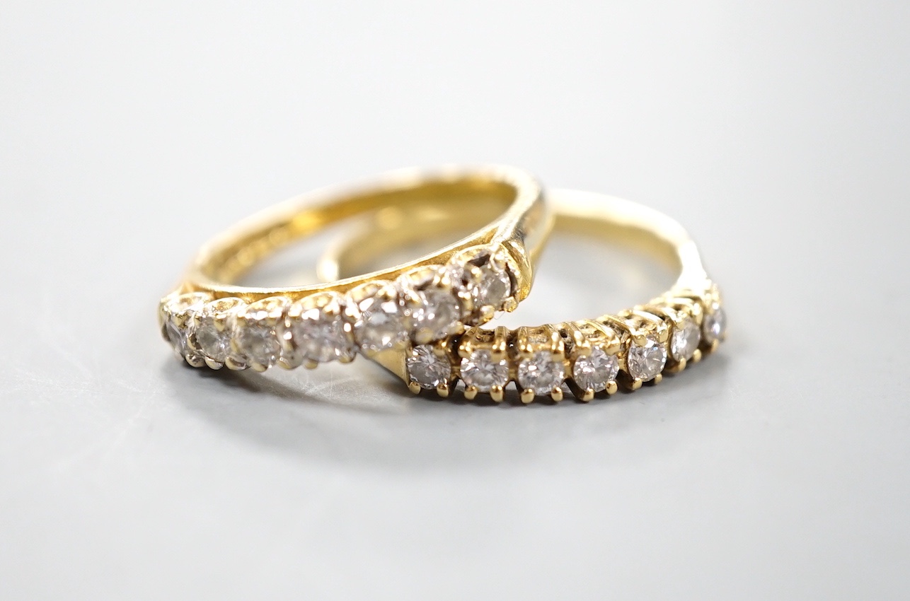 Two modern 18ct gold and seven stone diamond set half eternity rings, sizes M and Q/R, gross 5.9 grams.